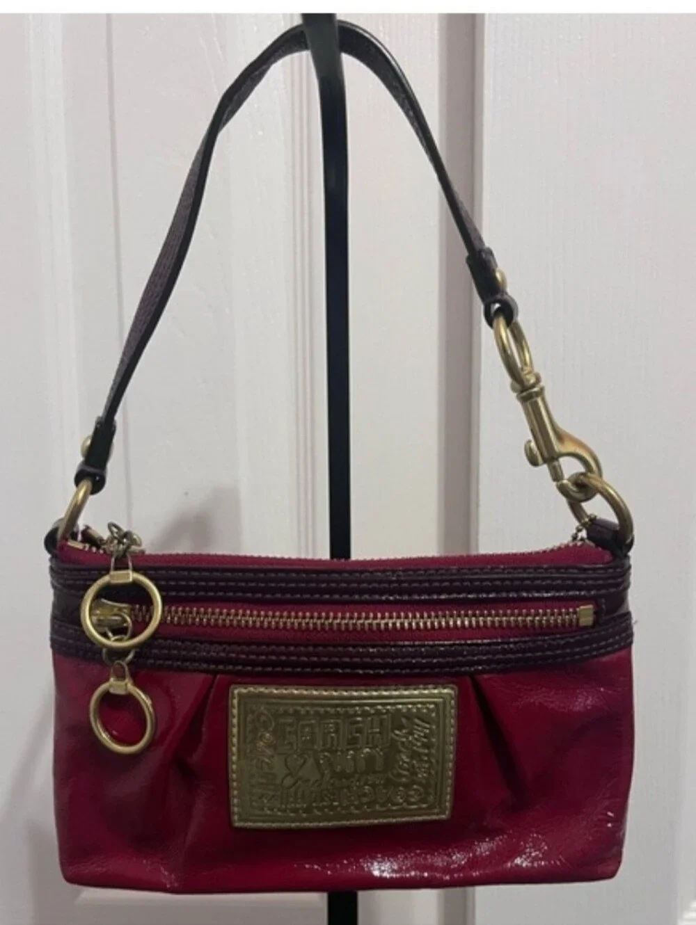 Coach Poppy Red Patent Wristlet with Brass Accents, Minor Callouts, Clean Inside